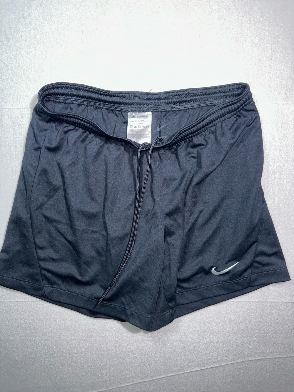 Nike Men’s Black Athletic Shorts with Silver Swoosh
